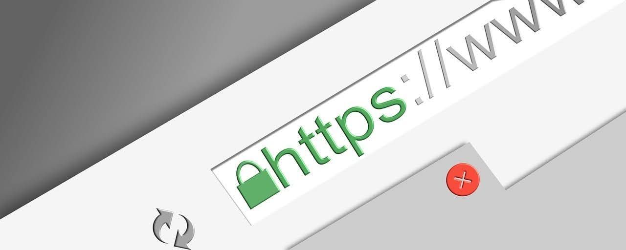 Close-up of a web browser address bar displaying https:// with a green padlock icon, indicating a secure connection.